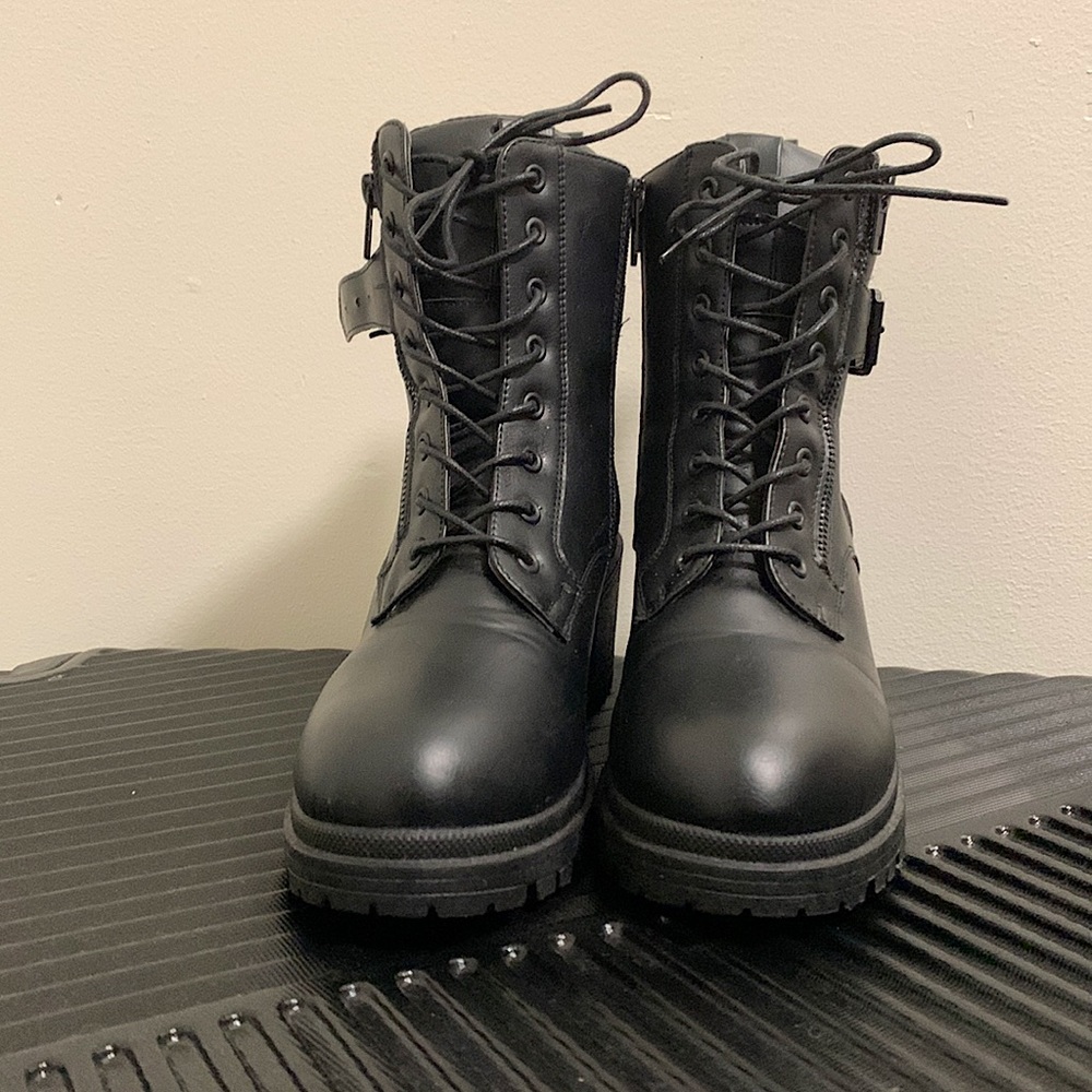 Heeled combat boots.
